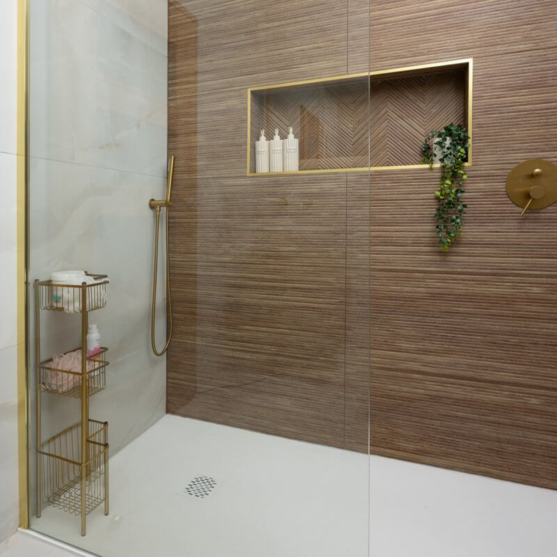 Neutral-toned small bathroom with cohesive tile design