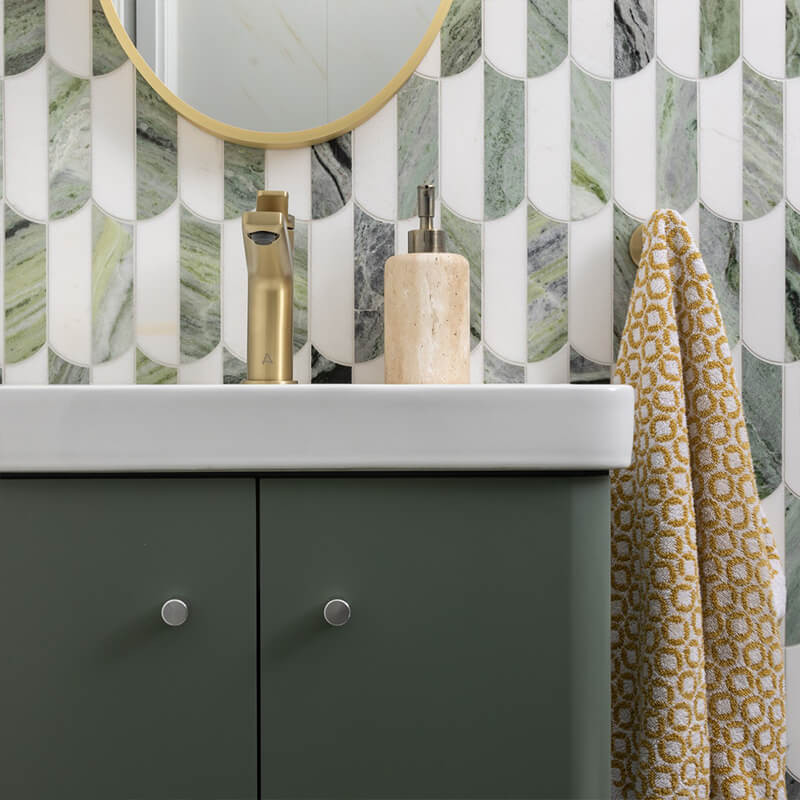 Small bathroom featuring mosaic tile flooring