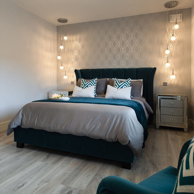 Pet-friendly bedroom with durable laminate flooring, a smart upgrade from carpet.