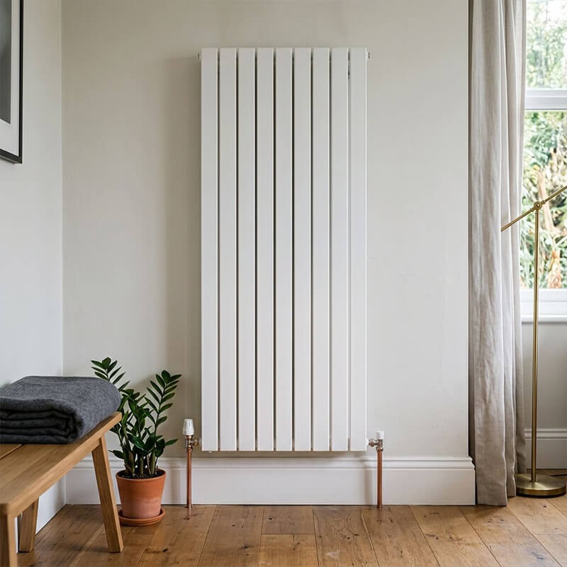Modern white radiator Modern white vertical radiator in a home interior