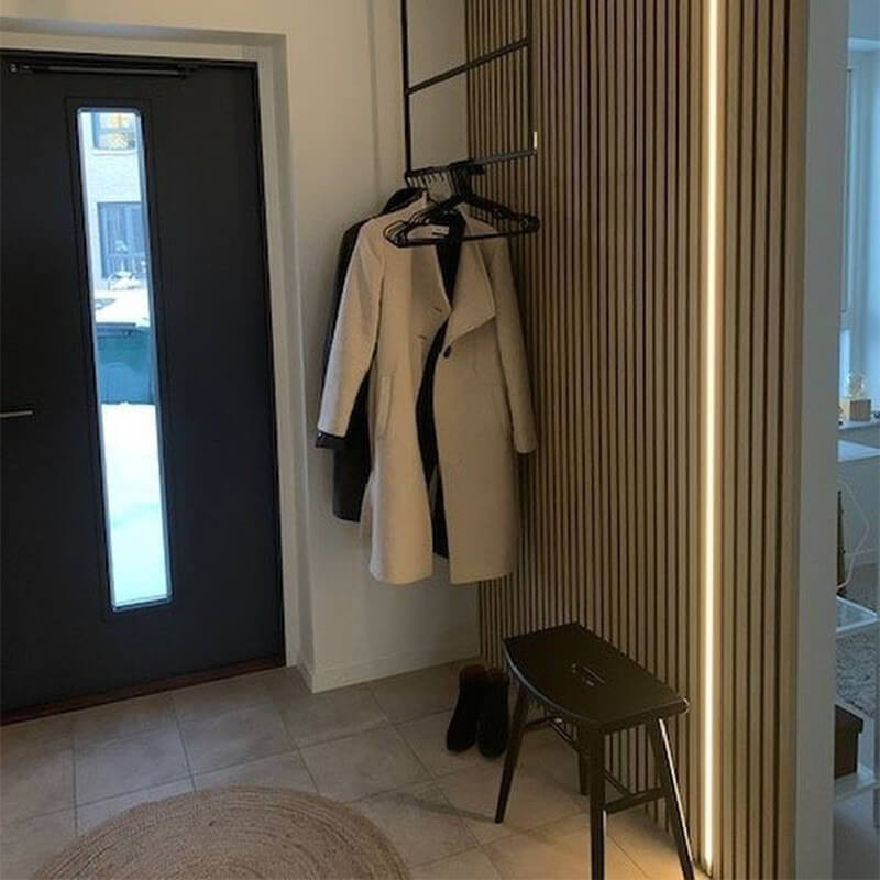 Beautiful wall paneling on stairs for a refined hallway