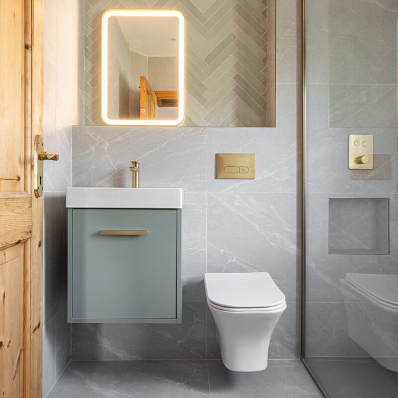  Small bathroom featuring light floor tiles and light walls