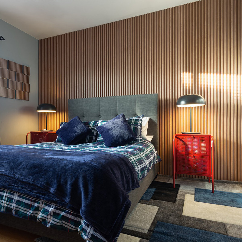 Elevate your space with the beauty and texture of real wood wall panels. Get Ideas and Panelling Designs here.