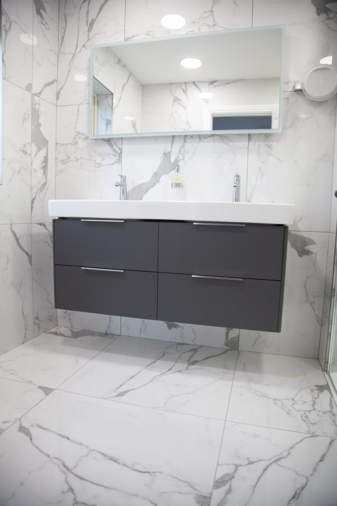 Large format tiles are ideal to use in bathroom, even small bathrooms.