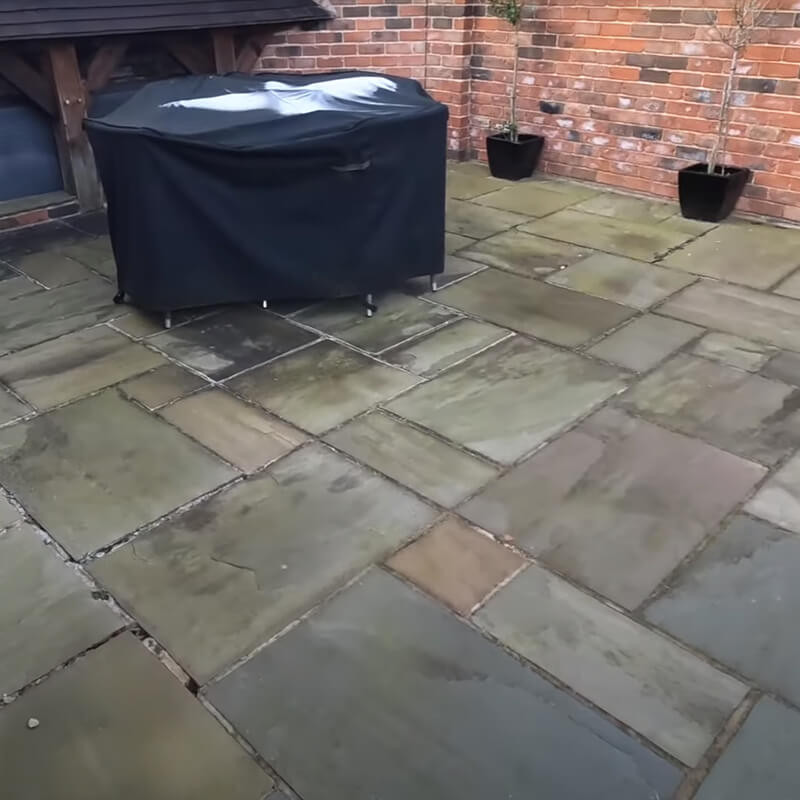 Beautiful outdoor setting showcasing moss growth on stone paving
