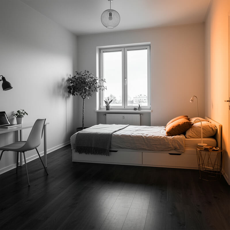 Rustic bedroom featuring wood-look laminate flooring for a natural aesthetic.