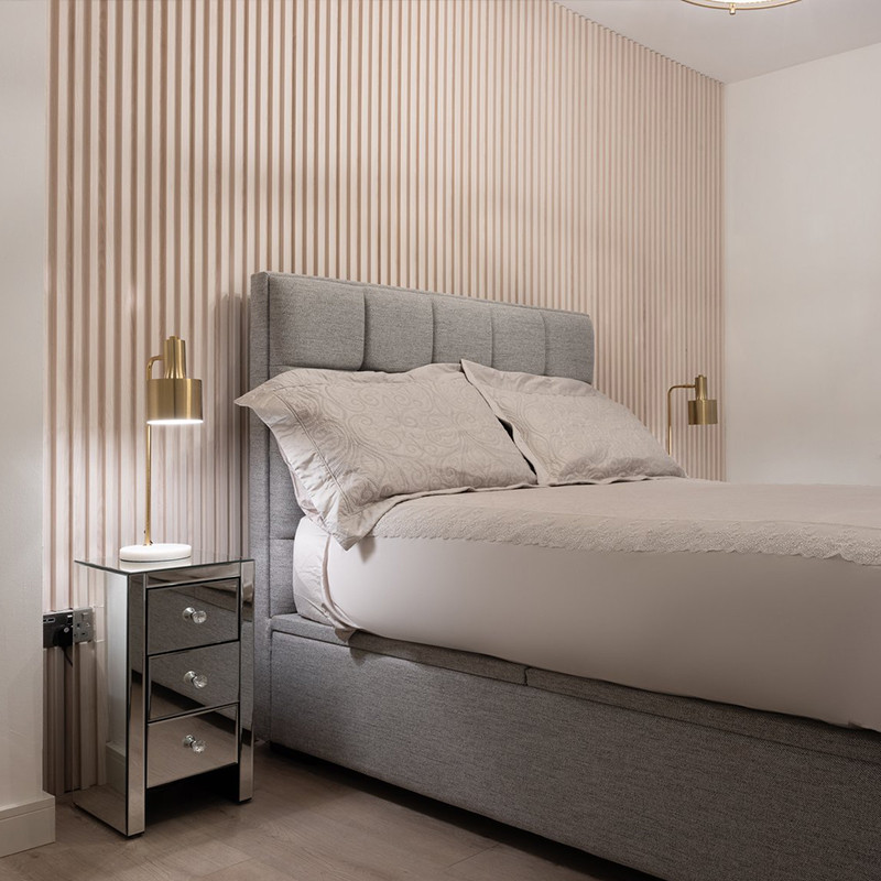 Modern bedroom featuring white wall panels with clean lines, creating a sense of spaciousness. Wall Panel Design
