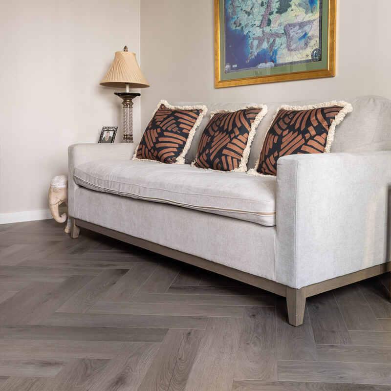 SPC vinyl flooring under a cozy sofa setup in an Irish living room.