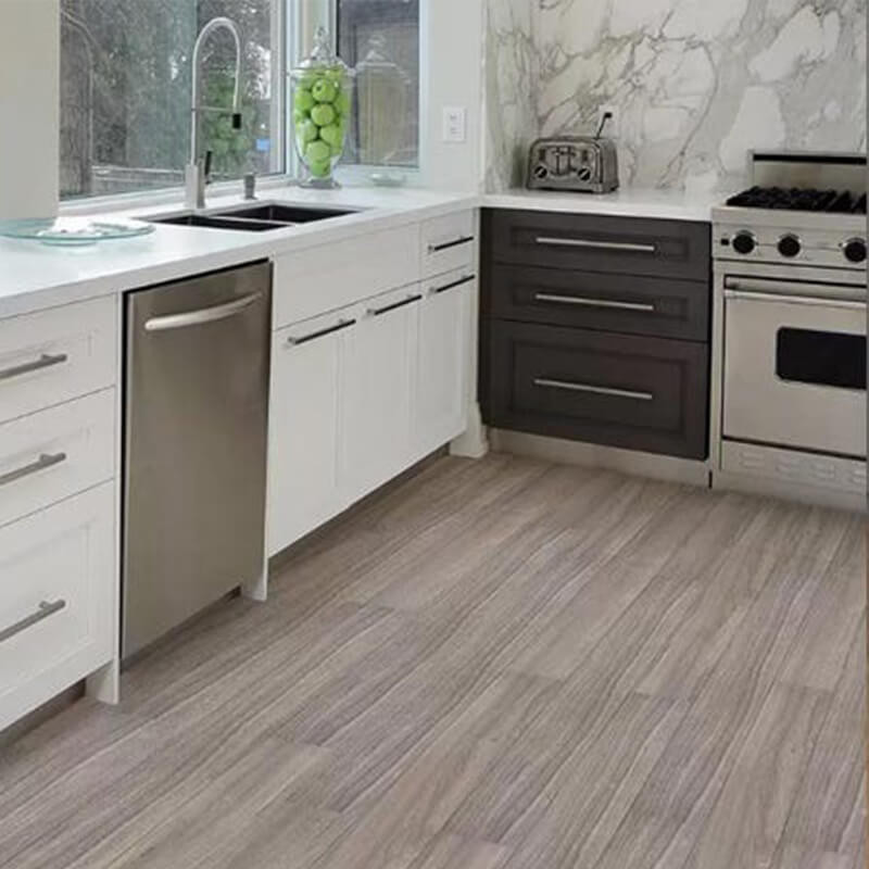Easy-to-clean SPC vinyl flooring with a classic stone pattern adds timeless elegance to a traditional kitchen.