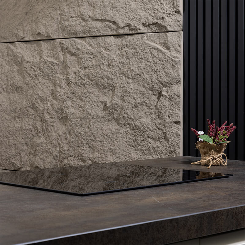 Close-up of PU stone wall panels showing their realistic texture.