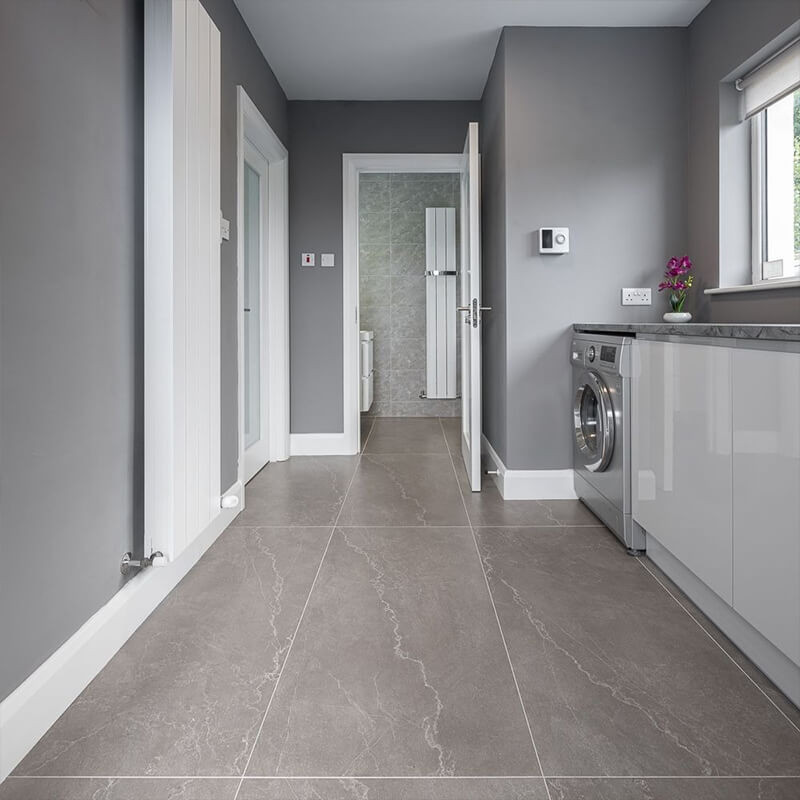 Kitchen heating mat rolled across the subfloor after tiling