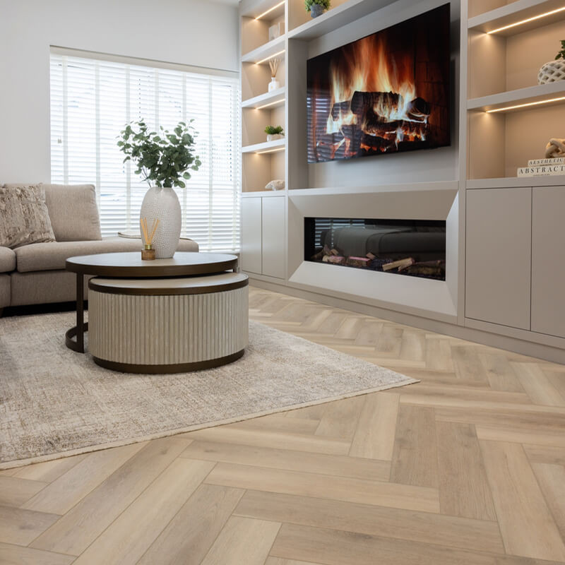 100% waterproof SPC flooring in a bright lounge with fireplace and entertainment unit