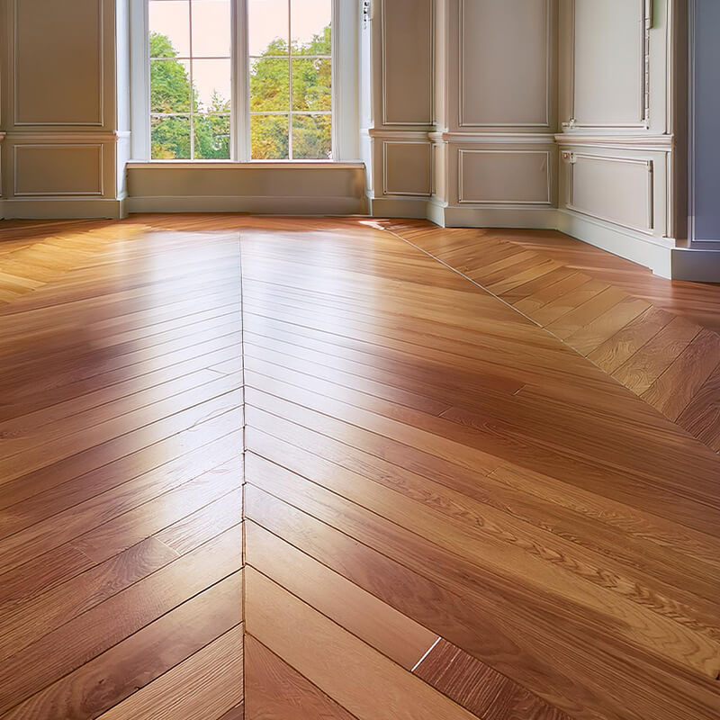 Engineered wood flooring with decorative skirting in a traditional dining room