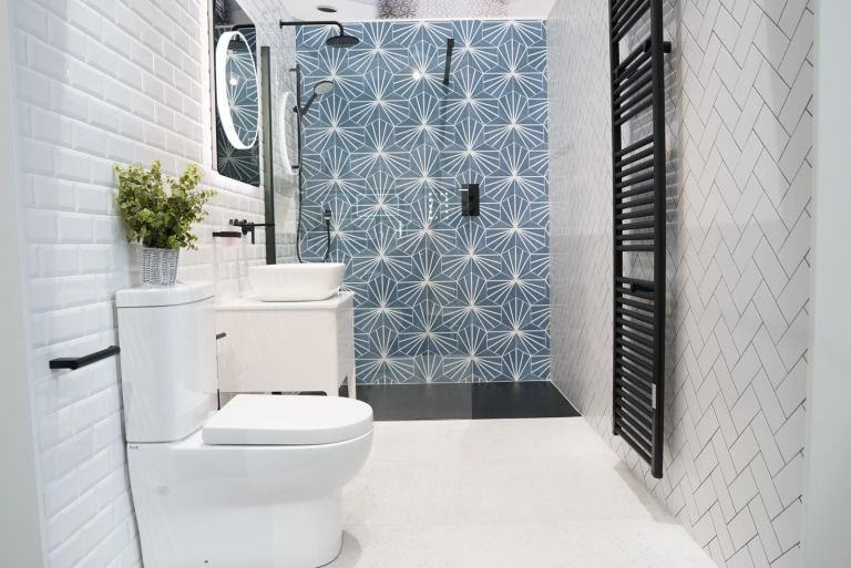 Light blue tiles installed in a bathroom