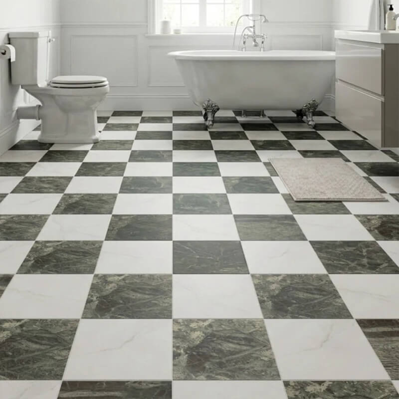 Checkerboard porcelain bathroom floor Bathroom floor in dark green marble-effect and white porcelain tiles laid in a checkerboard pattern beside a roll-top bath