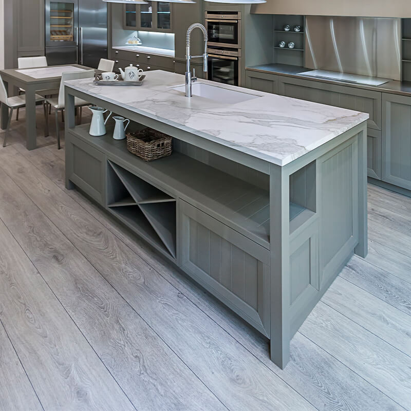 Kitchen remodel inspiration: Classic ceramic tiles in a timeless pattern anchor a traditional design.