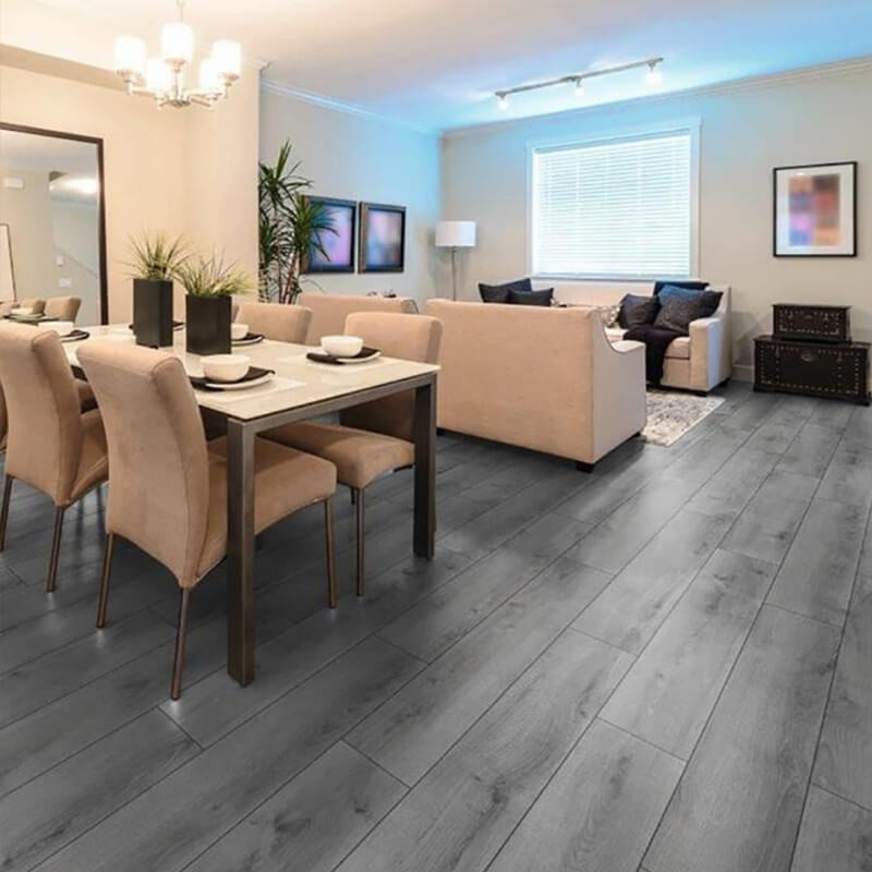 Light and airy laminate flooring with a subtle wood grain pattern opens up a small kitchen.