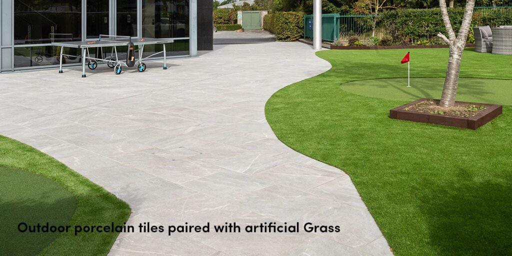 Outdoor Porcelain paving slabs paired with artificial grass. This is a new installation in Ireland. All materials are supplied by Tile Merchant Ireland