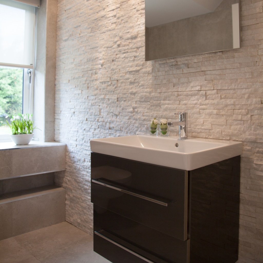 Use of stone cladding in a bathroom is a popular trend in Ireland