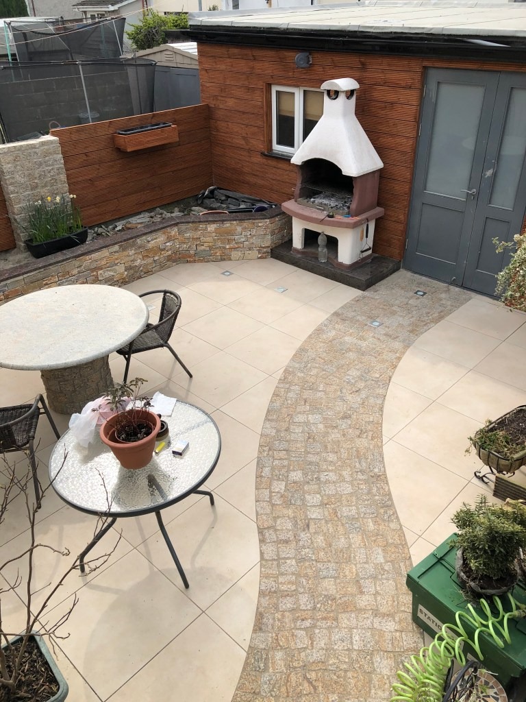 Beige outdoor tiles installed in a fantastic garden in Cork